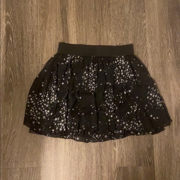 Black skirt with white flowers. - Picture 1 of 1